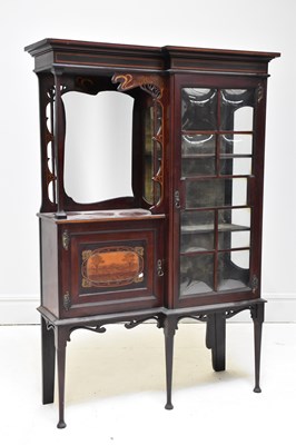 Lot 1017 - An Art Nouveau inlaid mahogany display cabinet,...