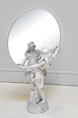 Lot 581 - GOLDSCHEIDER; a large painted figural mirror...