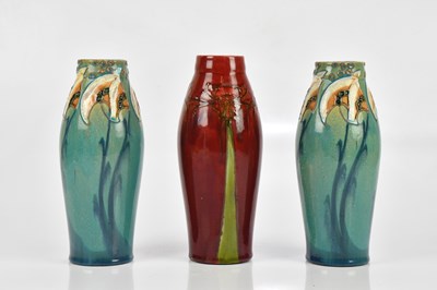 Lot 411 - MINTON; three Secessionist range vases, with...