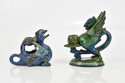 Lot 532 - CHARLES H BRANNAM; two art pottery candle...
