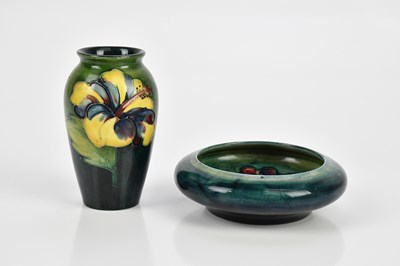 Lot 570 - WALTER MOORCROFT; a circular dish in the 'Leaf...