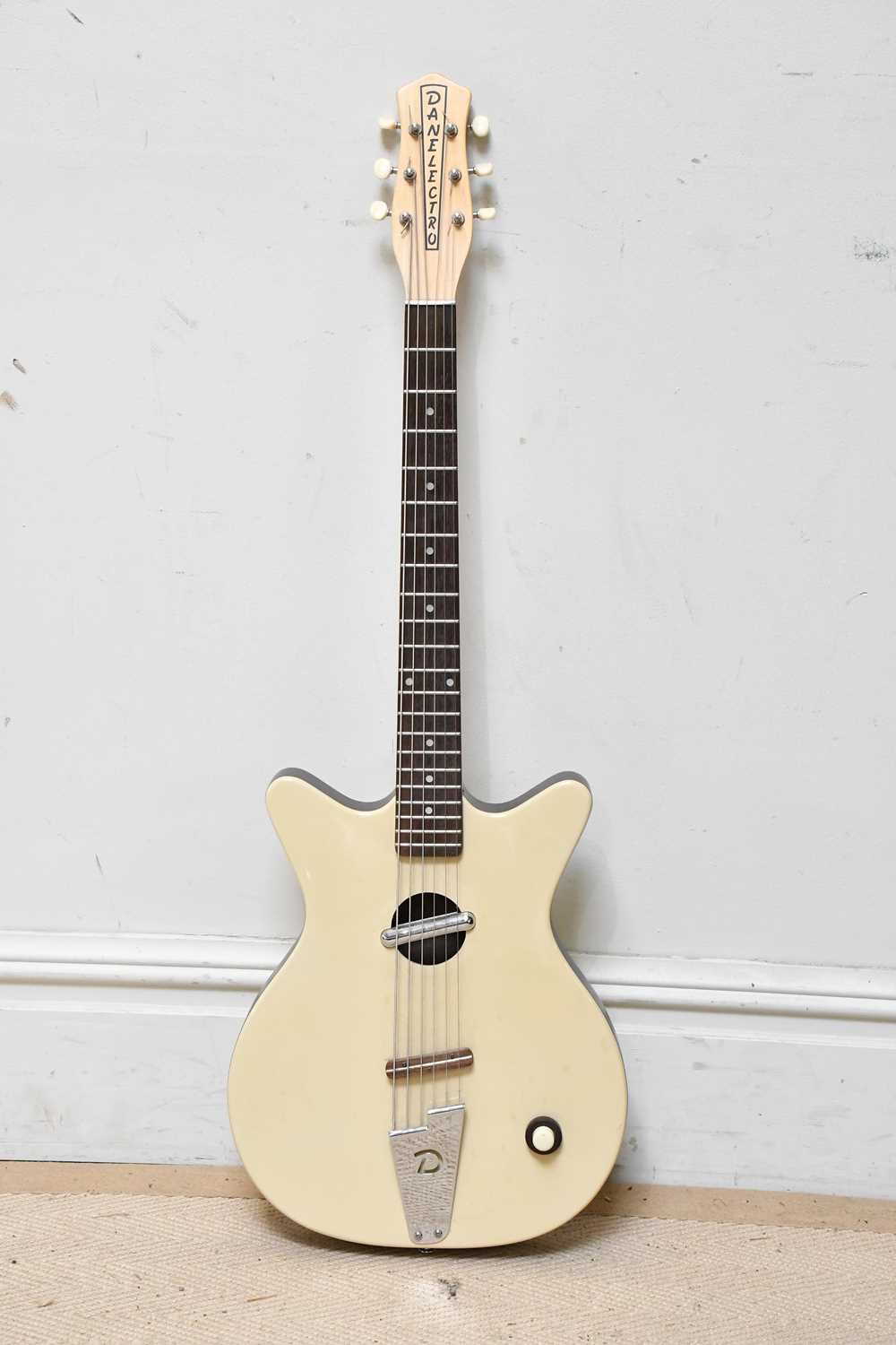 Lot 1048 - DANELECTRO; a 59 electro acoustic guitar,...
