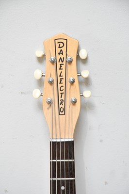 Lot 1048 - DANELECTRO; a 59 electro acoustic guitar,...