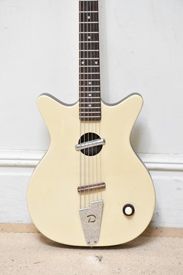 Lot 1048 - DANELECTRO; a 59 electro acoustic guitar,...