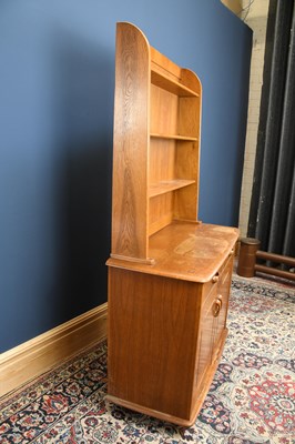 Lot 580 - An Ercol type light oak dresser, with three...