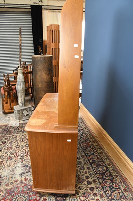 Lot 580 - An Ercol type light oak dresser, with three...