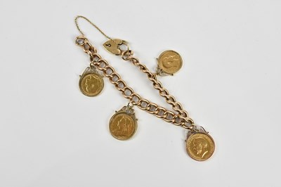 Lot 204 - A yellow metal curb link bracelet with 9ct...