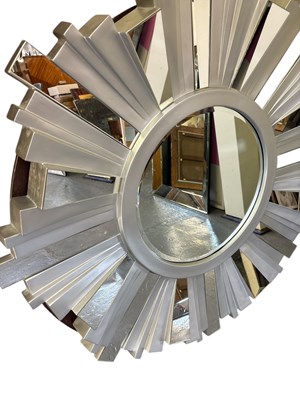Lot 23 - A modern circular sunburst type wall mirror,...
