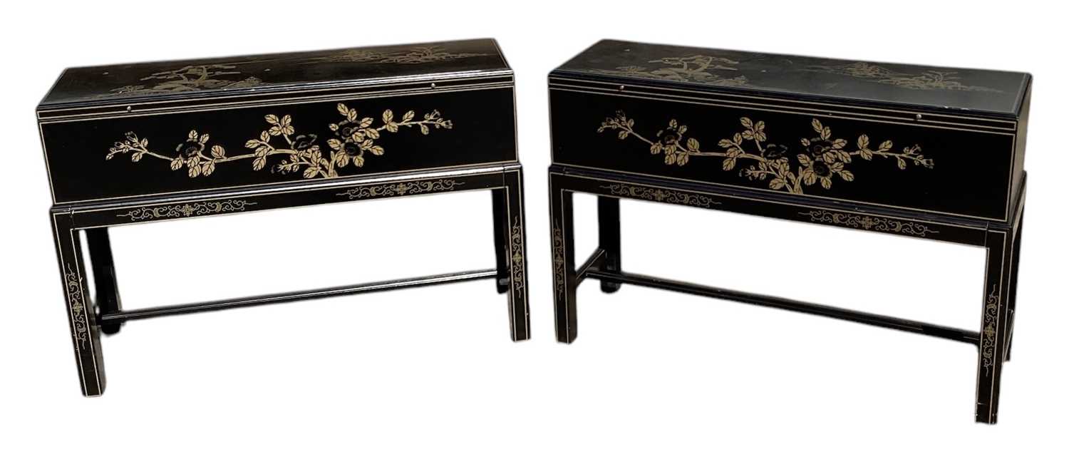 Lot 38 - A pair of modern Japanese black lacquer effect...