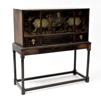 Lot 59 - An Oriental-style cabinet on stand with simple...