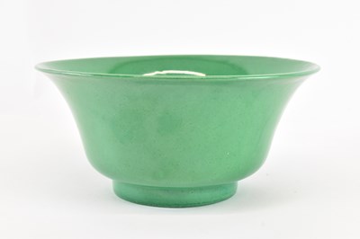 Lot 1007 - A Chinese Qing dynasty green glazed bowl,...