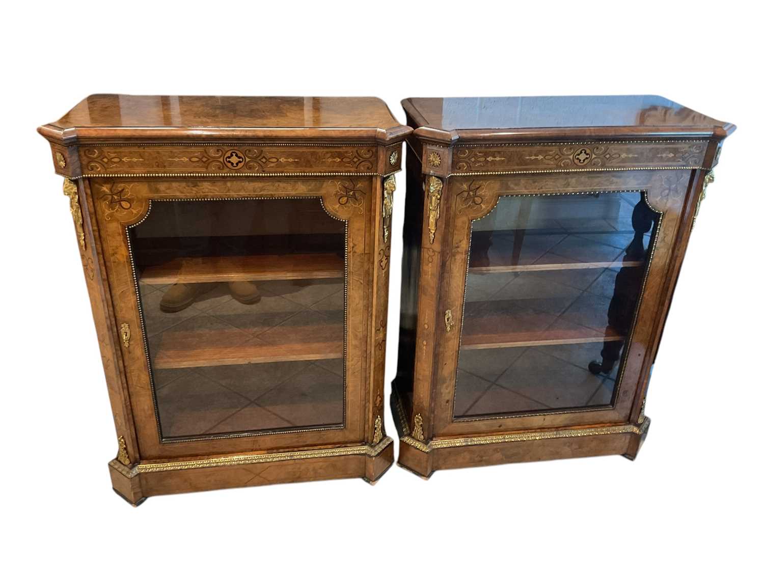 Lot 7 - A pair of Victorian walnut and inlaid ormolu...