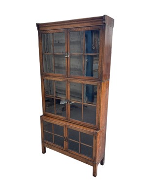 Lot 1103 - An oak three section stacking bookcase, height...