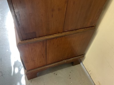 Lot 29 - An early 19th century mahogany linen press,...