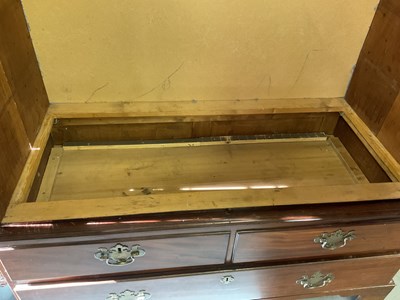 Lot 29 - An early 19th century mahogany linen press,...