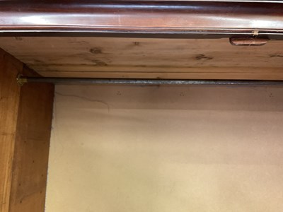 Lot 29 - An early 19th century mahogany linen press,...