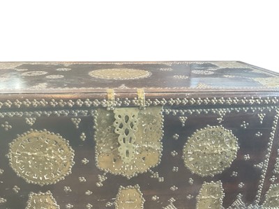 Lot 28 - A 19th century African hardwood Zanzibar chest,...