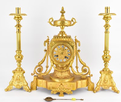 Lot 121 - A 20th century French gilt brass clock with...