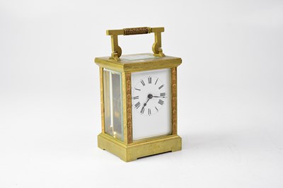 Lot 131 - A brass cased carriage clock, the enamelled...