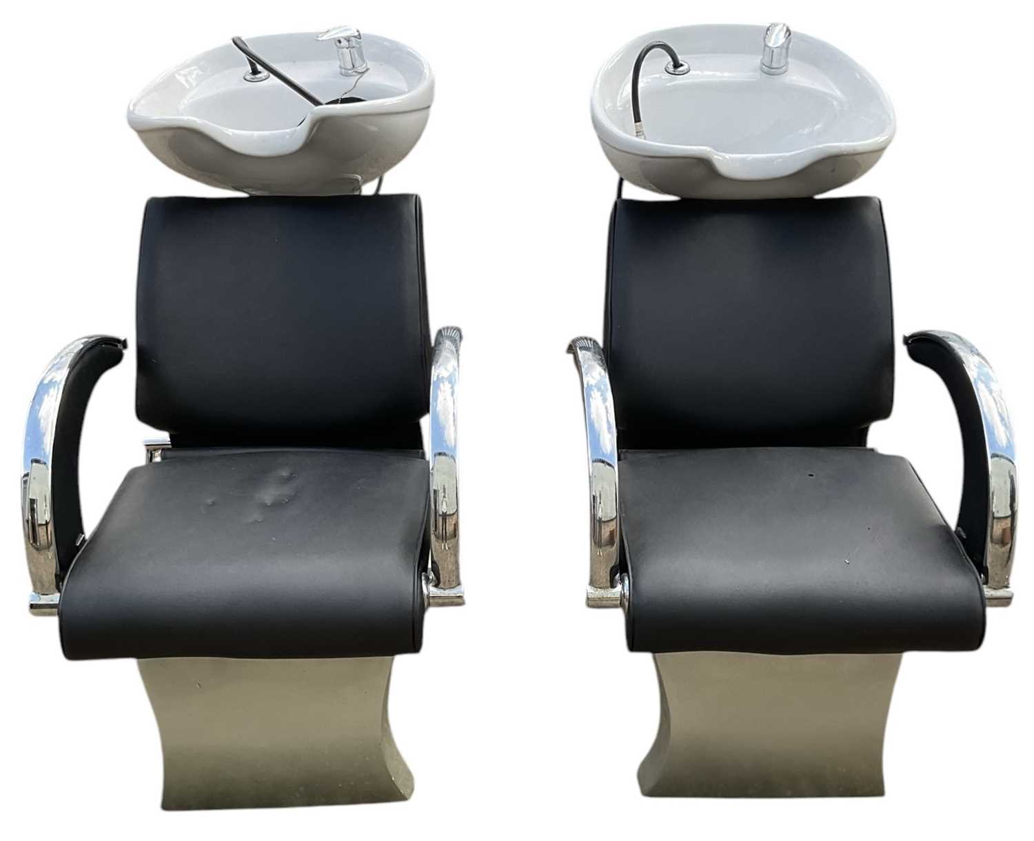 Lot 9 - A pair of modern contemporary black leather...