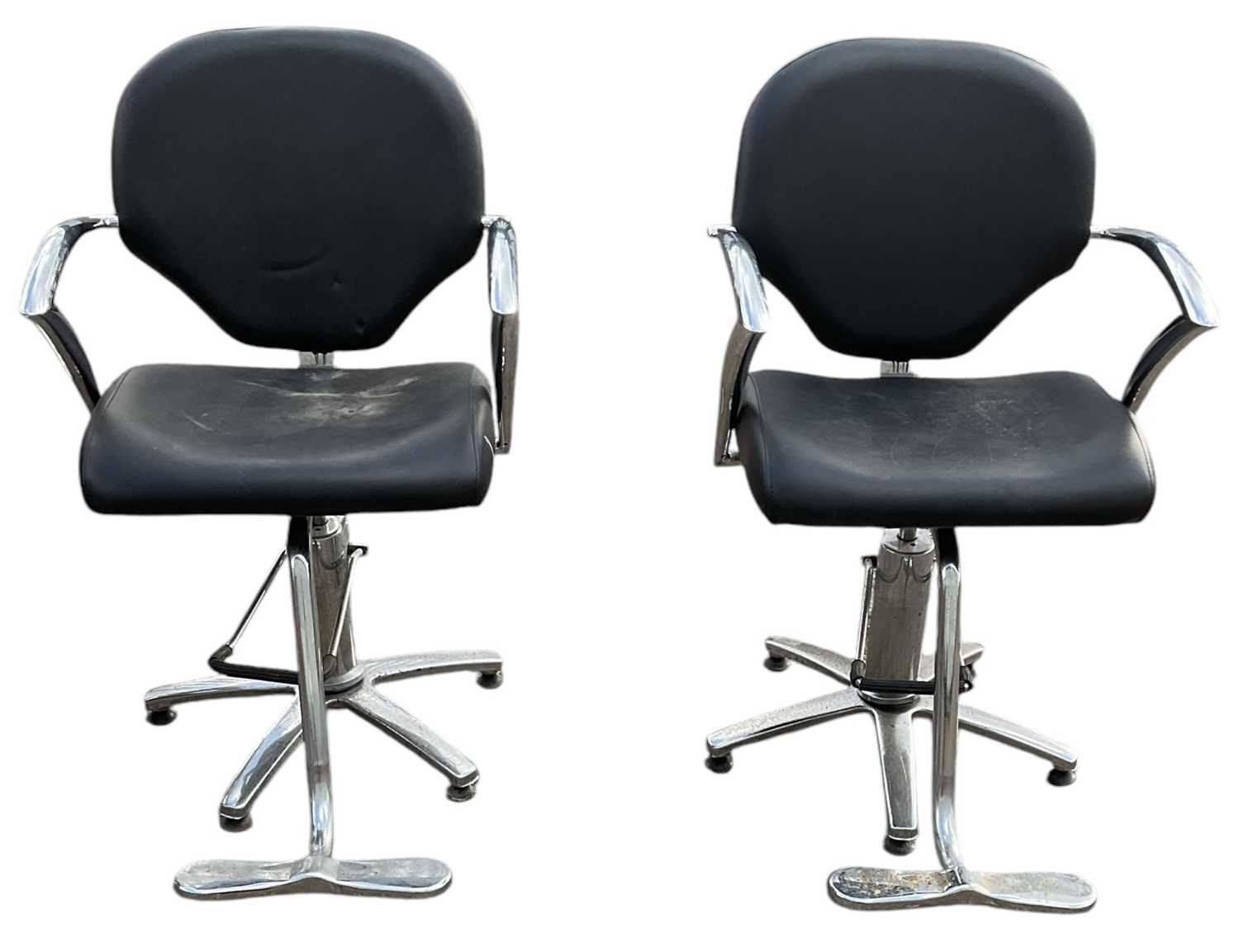 Lot 26 - A pair of modern contemporary black leather...