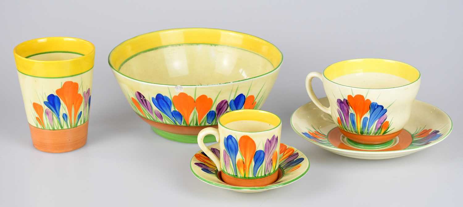 Lot 210 - CLARICE CLIFF; six pieces decorated in 'Crocus'...