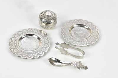 Lot 1344 - A pair of Eastern white metal circular dishes,...