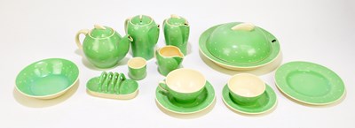 Lot 211 - SUSIE COOPER; a breakfast set decorated with...