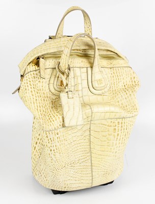 Lot 673A - GIVENCHY; a cream and beige crocodile embossed...