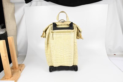 Lot 596 - GIVENCHY; a cream and beige crocodile embossed...