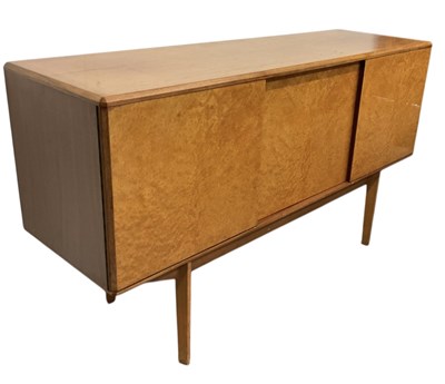 Lot 31 - A mid century satinwood veneered sideboard and...