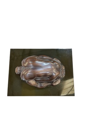 Lot 744 - A modern abstract bronze figure of kneeling...