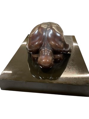 Lot 744 - A modern abstract bronze figure of kneeling...