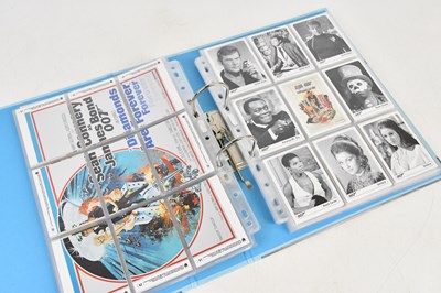 Lot 1756 - JAMES BOND; a large collection of trade cards...