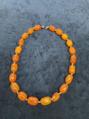 Lot 304 - An early 20th century egg yolk/butterscotch...