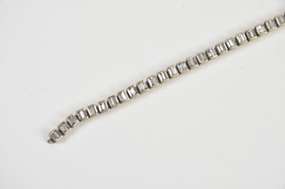 Lot 15 - A white metal diamond set tennis bracelet,...