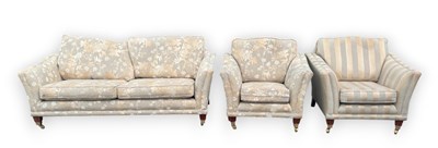 Lot 2201 - PARKER KNOLL; a three piece suite, with floral...