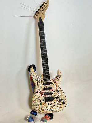 Lot 189 - STARFORCE; a six string electric guitar with...