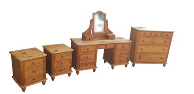 Lot 2210 - A modern pine bedroom suite, comprising seven...