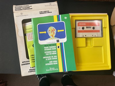Lot 2435 - TEXAS INSTRUMENTS; a home computer, TI-99/4A,...