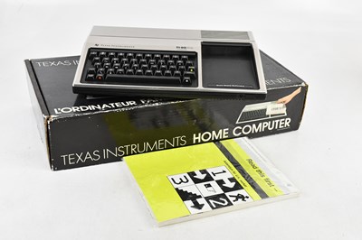 Lot 2450 - TEXAS INSTRUMENTS; a home computer, TI-99/4A,...
