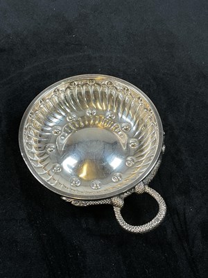 Lot 412 - A French silver tastevin with stylised serpent...