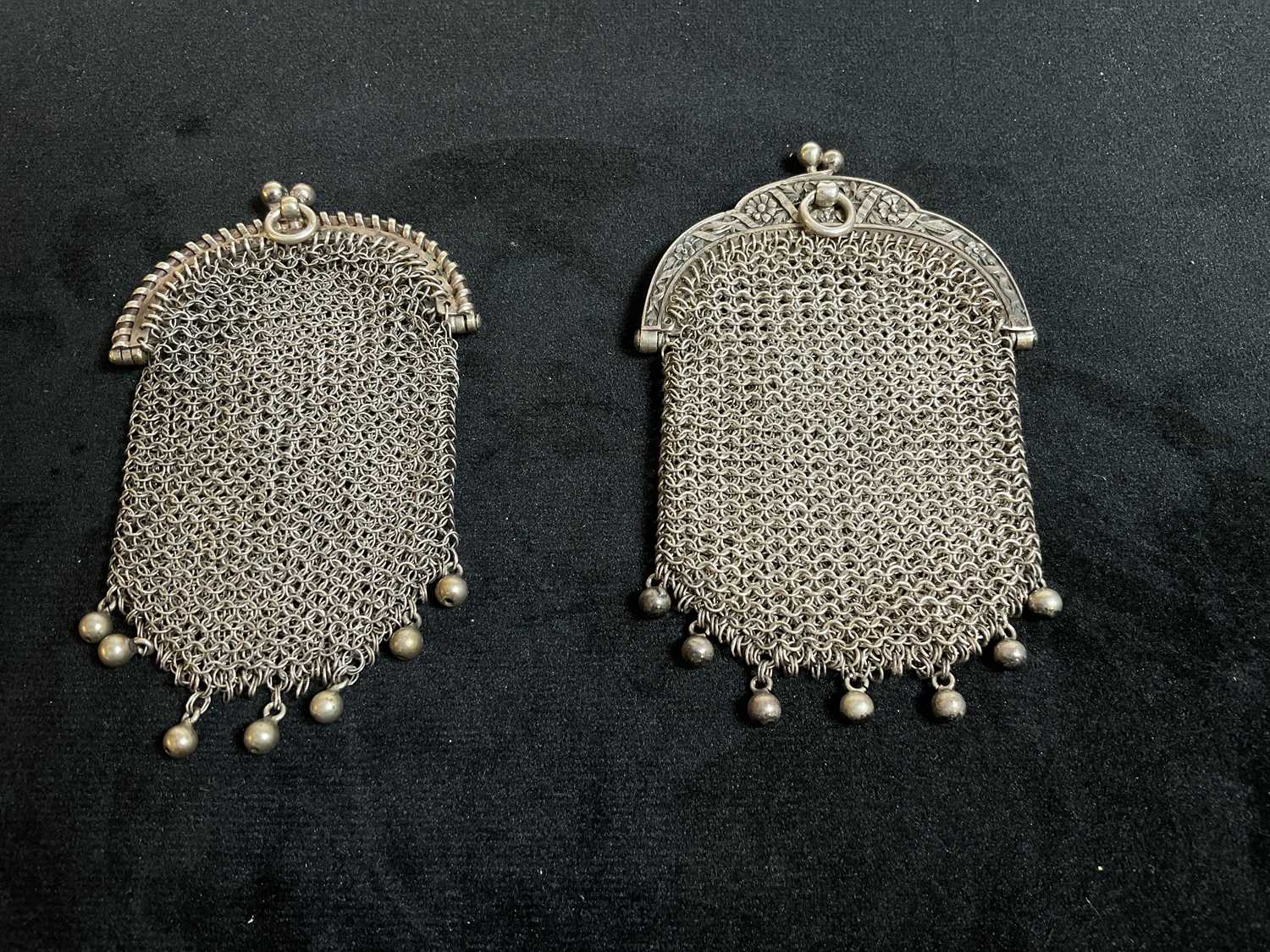 Lot 413 - A French small silver mesh purse with internal...