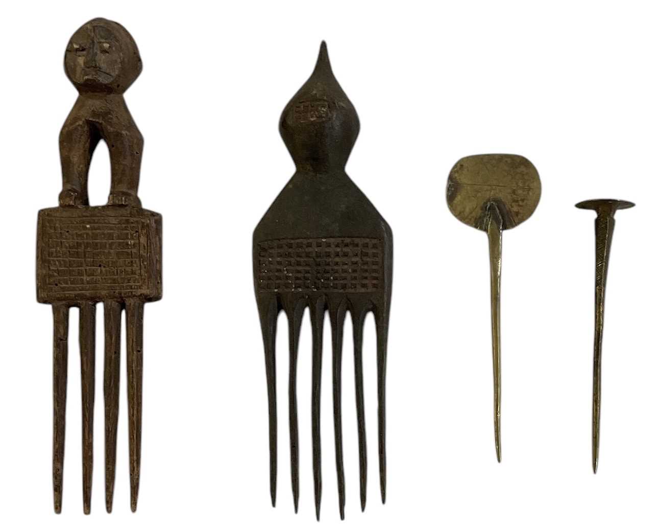 Lot 770 - Two Lobi people, Burkina Faso head scratchers...