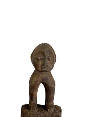 Lot 770 - Two Lobi people, Burkina Faso head scratchers...