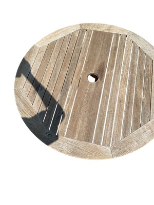 Lot 135 - BARLOW TYRIE; a modern circular folding garden...