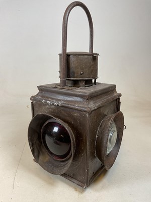 Lot 4 - A large vintage railway lamp with four lenses...