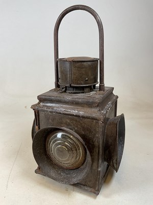 Lot 4 - A large vintage railway lamp with four lenses...