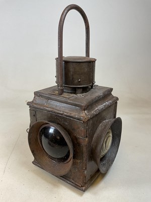 Lot 4 - A large vintage railway lamp with four lenses...