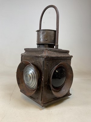 Lot 4 - A large vintage railway lamp with four lenses...